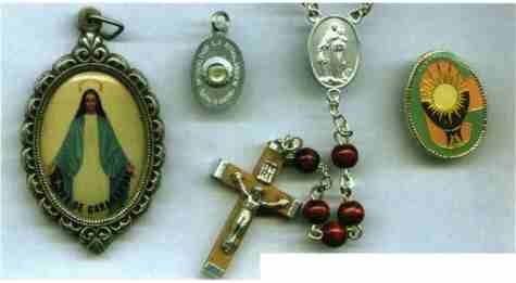 Religious medals and rosary with crucifix.