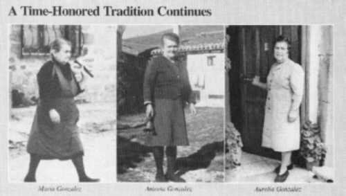 Three women in vintage dresses, standing outside.